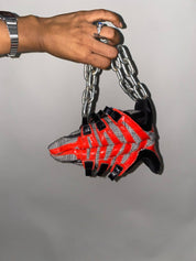 JEFFERY CAMPBELL SNEAKER CLUTCH